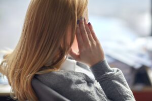 close up of woman having headache