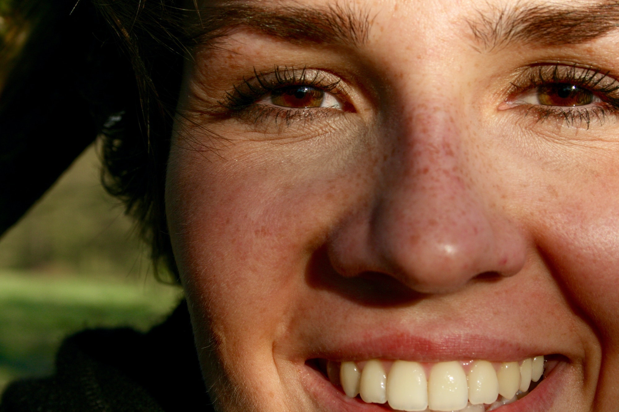 Happy face of a young woman in close-up
